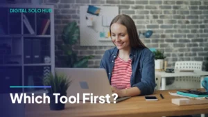 Zapier vs Make vs n8n for freelancers: woman working on a laptop in an office, deciding which automation tool to learn first